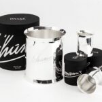 STAINLESS STEEL AND SILVER PLATED CHAMPAGNE BUCKET AND TUMBLER - DESIGNED BY CHARLES SCHUMANN