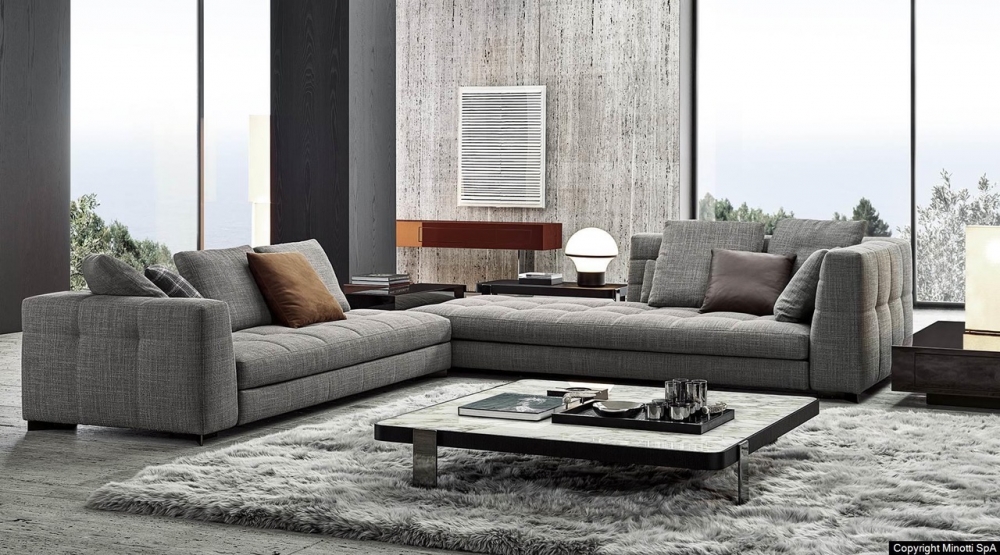 BLAZER seating system by RODOLFO DORDONI, designed in 2020. The key feature of the design is the backrest with rounded internal corners, which creates a comfortable, enveloping niche, transforming the chaise-longue element with tall backrest and armrest into a particularly welcoming alcove.