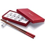 SWING chopsticks holder. Inspired by the ‚Äútorsade‚Äù branches of the Baccarat chandeliers, this chopstick holder is the perfect table accessory. In the absence of chopsticks, it becomes a beautiful knife or spoon holder.From the branches of a Zenith chandelier, to the sides of the perfect table arrangement. This chopstick holder is the perfect table accessory. In the absence of chopsticks, it becomes a beautiful knife or spoon holder. Price ‚Ç¨230