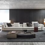 BLAZER sofa by RODOLFO DORDONI, designed in 2020. Virtuous combination of its design appeal, visible in the rigorous geometry of its volumes, and the haute couture approach exemplified by its precise, meticulous sartorial craftsmanship, blazer is one of the creations that best expresses the most authentic artisanal attitude of MINOTTI.