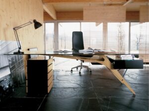 Desk CAVOUR by CARLO MOLLINO 1949. CAVOUR is an home-office desk, resulted from an excercice on the research on the perfect structural shape, which CARLO MOLLINO has studied in his projects for the ski station. The dialectic of opposites finds expression in the balanced contrast between the organic and dynamic lines of the structure and the geometry of the clean and static volumes of the storage compartment and of the chest of drawers.