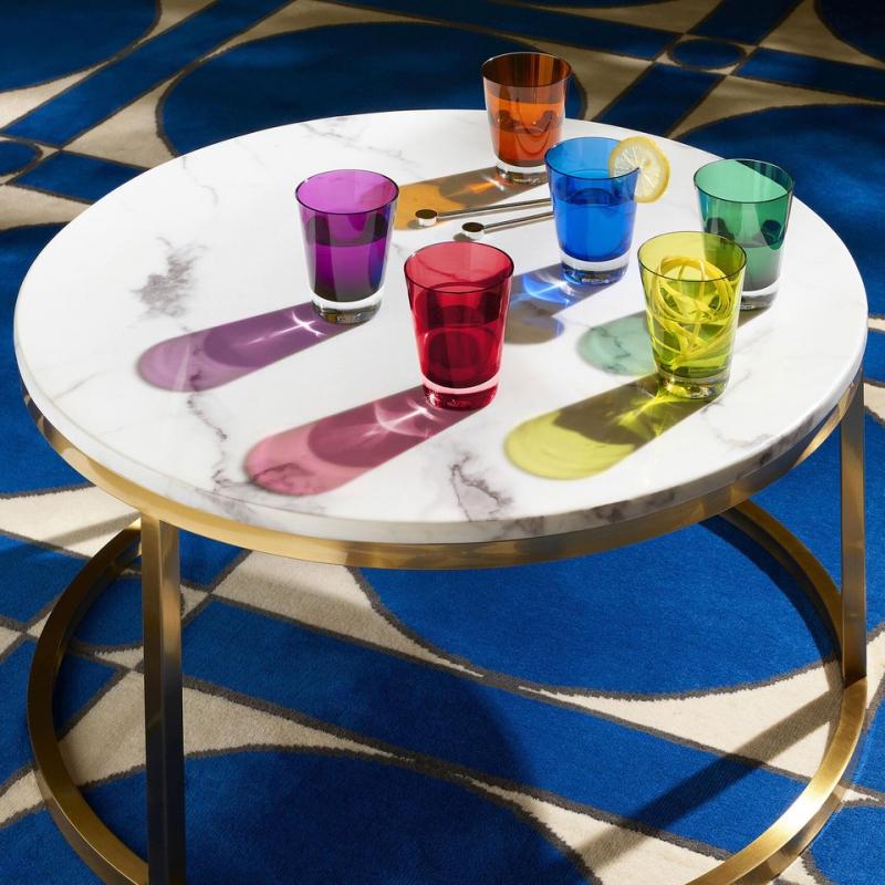 MOSA√èQUE tumblers set. Handcrafted using traditional glassblowing techniques, these glasses are the perfect gift! Available in a set of 6 in 6 different colors. The tableware has a simple silhouette that is precise and elegant. The understated shape of the tumblers makes their use appropriate for any and all drinking experiences: as a water or fruit juice glass, or mixed in with Baccarat clear crystal bar sets. The hand-blown MOSA√èQUE  umblers are cased in clear crystal, and are available in a vast array of cheerful colors in this set: orange, blue, purple, moss, green, and Baccarat‚Äôs signature ruby red crystal. The interplay of light with the smooth surface and the colored crystal makes for a radiant table, and a compelling soir√©e.