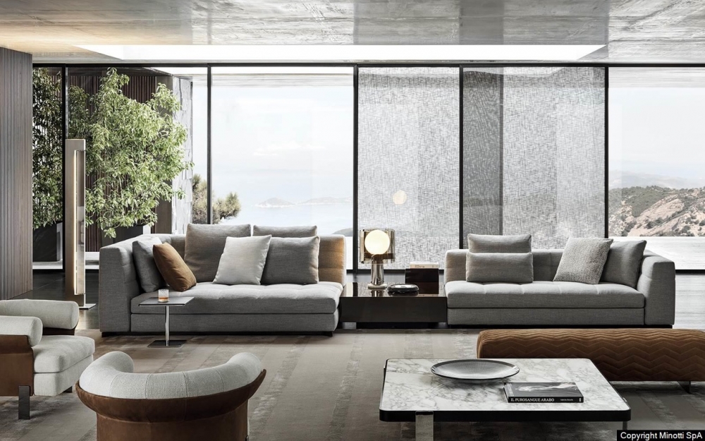 BLAZER seating system by RODOLFO DORDONI, designed in 2020. The system is complemented by a series of cushions in different sizes and headrests, which can be freely positioned, decorating the seats and offering maximum comfort.