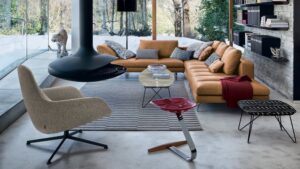 SOFA BRUCE BY LUDOVICA + ROBERTO PALOMBA 2013.POLISHED ALUMINUM ALLOY, OR WITH NATURAL OR BLACK NICKEL-SATIN FINISH, OR BLACK PAINTED. STEEL FRAME. ELASTIC STRIPS SUSPENSION. UPHOLSTERY IN GRADUATED POLYURETHANE/ DACRON DU PONT. SEAT CUSHION IN POLYURETHANE/DACRONDU PONT. BACK AND ARMREST CUSHIONS IN GOOSE FEATHER. UPHOLSTERY OF ROLL-SHAPED CUSHION IN POLYURETHANE/ HEAT-BOUND POLYESTER FIBRE. REMOVABLE COVER IN FABRIC OR LEATHER.