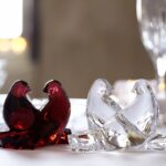 DOVES designed by CLAUS HARTUNG. Their silhouettes interweave in concert with one another, creating an appealing symmetry. Designed by CLAUS HARTTUNG for Baccarat, the grace and beauty of these two birds is evoked through the precision of the craftsmanship, from their slender bills to the detailing on their splayed feathers. Nimbly rendered, the love between them is easily perceptible. These doves are a perfect gift that tenderly symbolizes your devotion to your beloved. This affectionate duo of doves is also available in clear crystal.