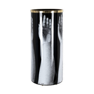 UMBRELLA STAND MANI. WHEREVER YOU MAY FIND SHELTER AFTER A WALK UNDER THE RAIN, MAKE SURE YOUR UMBRELLA STANDS IN FORNASETTI UMBRELLA STAND. ITS EXCEPTIONALLY CRAFTED SHAPE AND CAREFULLY SELECTED DESIGNS WILL TURN A RAINY DAY INTO A PRECIOUS ARTISTIC EXPERIENCE. DETAILS- COLOUR: BLACK AND WHITE, HEIGHT: 57CM, DIAMETER; 26CM
