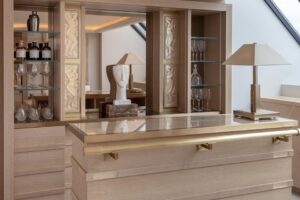 LALIQUE SUITE'S BAR by PATRICK HELLMANN at PRINCE DE GALLES HOTEL, PARIS,WHICH FEATURES BEAUTIFUL LALIQUE CRYSTAL PANELS, INCLUDING THE PANEL