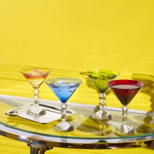 V√âGA martini glasses. The perfect glass set for the perfect dry martinis at home. Invite your friends and enjoy !    The geometric stem is eye-catching, a stack of three diabolo shaped Baccarat crystal pieces resembling exquisite beads strung together or Brancusi's geometric totems.Iconic lineage.