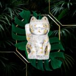 FAUNACRYSTOPOLIS CAT MANEKI NEKO. A traditional Japanese talisman.