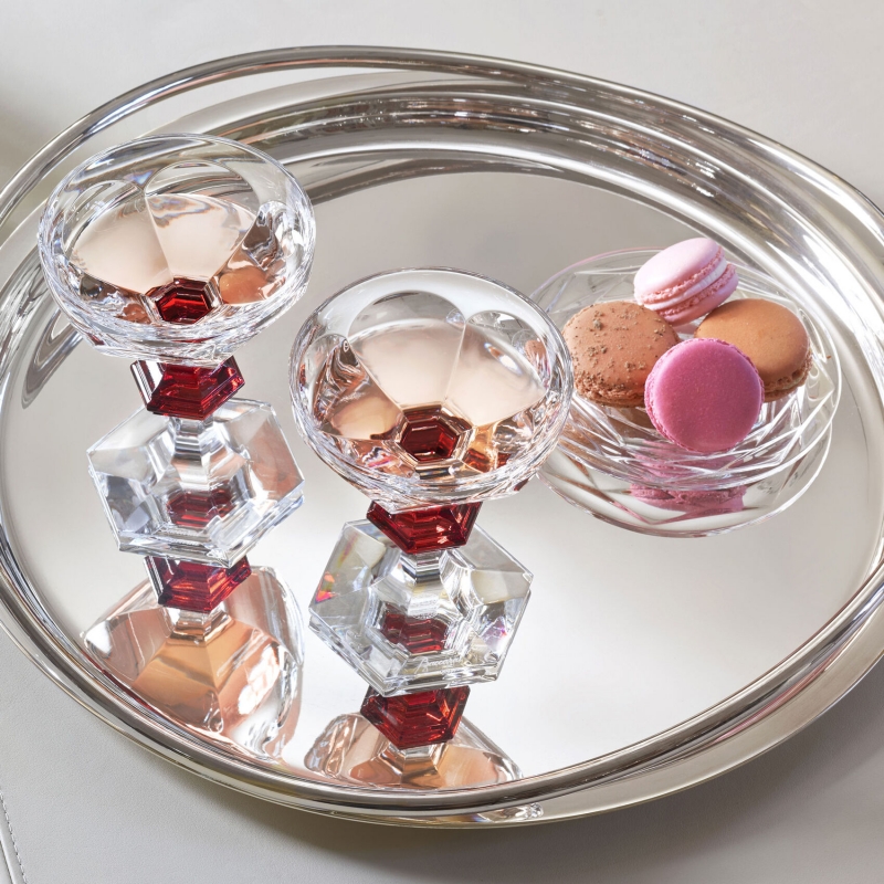 HARCOURT 1841 champagne coupe.Legendary glass, star of all exceptional parties, the HARCOURT CHAMPAGNE coupe is adorned with a red button, single-handedly embodying Baccarat's know-how and glamorous art of living