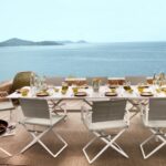 Folding armchairs and dining table SEAX by French designer JEAN-MARIE MASSAUD