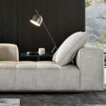 GOODMAN modular seating system by RODLOFO DORDONI , designed 2022.Compactness and softness come together in the same sofa concept, making it suitable for a more formal use both also for extreme relaxation; from the most traditional configurations to the more dynamic ones made possible by a series of individual components that animate the living space: end units, corner units, central units, chaise-longues. Each element is like a piece of a jigsaw puzzle to be joined with others to define its creator‚Äôs own home environment. Compact volumes capable of adapting to the space, the needs and tastes of the individual, as well as to the evolution of his or her living requirements over the years, easily changing into new compositions.