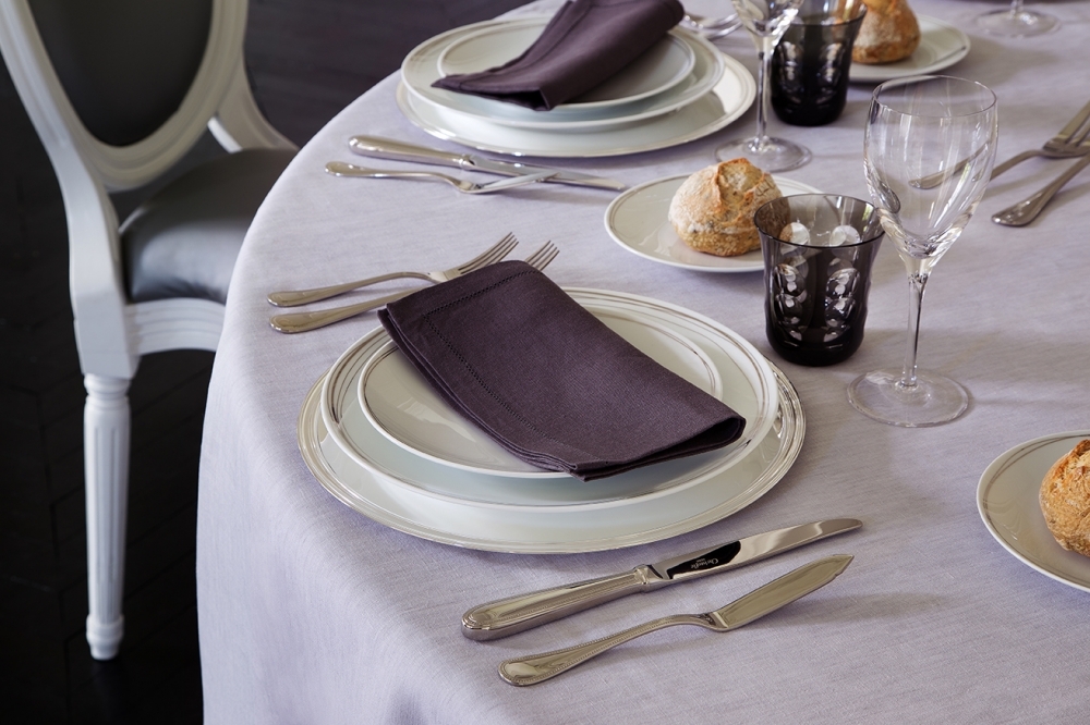 Porcelain plates VERTIGO - designer ANDR√âE PUTMAN; silver plated flatware collection PERLES; wine glasses ALBI, water glasses KAWALI