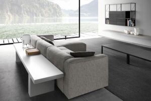 MATE 2012 SOFA by ROBIN RIZZINI, designed in 2012. A system of sofas and sectionals. With a frame in solid wood and elastic belts and a filling in indeformable variable-density polyether and down, or in polyester wadding. The new top stitched seam highlights the arms in the end, corner and special units.