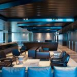 SHERMAN SOFAS AND BROOKS ARMCHAIRS UPHOLSTERED IN DARK BROWN LEATHER, YORK LOUNGE CHAIRS, AND THE STARR AND CESAR SIDE TABLES- MADDOCKS LAW OFFICES BY HASSELL DESIGN STUDIOS