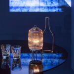 Inspired by the outline of some types of Japanese lantern, the C√âLESTE collection takes a new look at the rice grain elongated bevel cut. As a suspension or a wall light, placed on the ground or on its stand, these items provide a golden halo of light. Designer PHILIPPE NIGRO