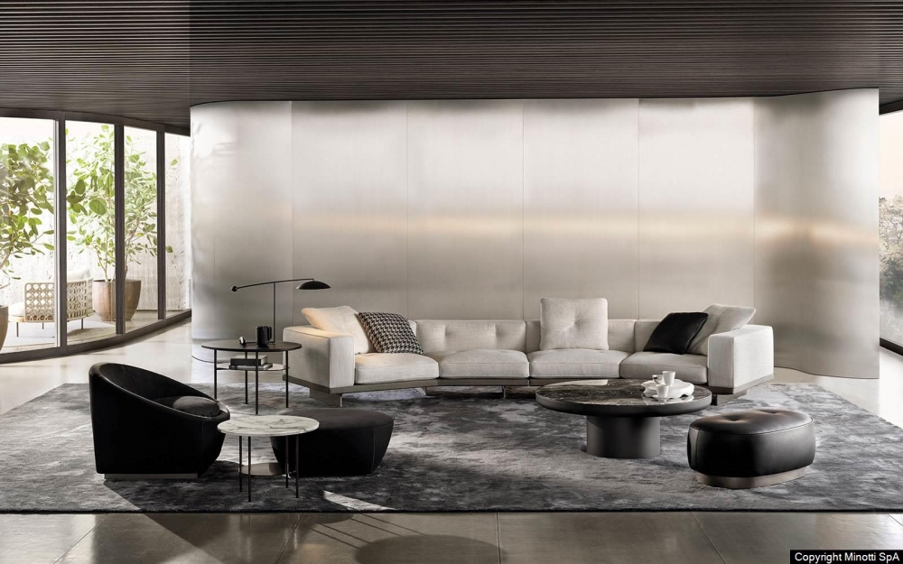 DYLAN sofa designed by RODOLFO DORDONI. A multifaceted and versatile lexicon in which the rigour of forms is combined with their ability to accommodate.