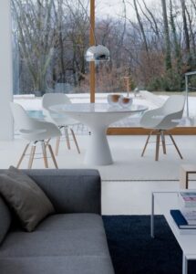 TABLE BLANCO BY JACOPO ZIBARDI 2010. ELEGANT AND SIMPLE AT THE SAME TIME, THE TABLE IS MADE OF CRISTALPLANT¬Æ, A TECHNOLOGICALLY ADVANCED MATERIAL BASED ON POLYESTER AND ACRYLIC RESINS LOADED WITH MINERALS, RESISTANT AND AGREEABLE TO THE TOUCH FOR ITS VELVETY AND NATURAL STONE-LIKE FINISH. THE ARCHETYPAL SHAPE IS DESIGNED TO LAST OVER TIME.