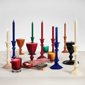 HARCOURT CANDLESTICK CANDLE. Inspired by BACCARAT'S most iconic creation, the HARCOURT CANDLESTICK CANDLE IS a graphic candle reinventing the original HARCOURT CANDLESTICK entirely in wax. Known as the collection of princes and greats, HARCOURT has adorned the world's most prestigious tables since 1841. Recognizable by its silhouette and light-catching facets, the HARCOURT CANDLESTICK CANDLE REVISITS its heritage with daring creativity. Available in a palette of bright, elegant colors, the collection captures the very essence of HARCOURT: a symbol of joie de vivre, boldness, and passion, remaining true to its history while always astonishing.